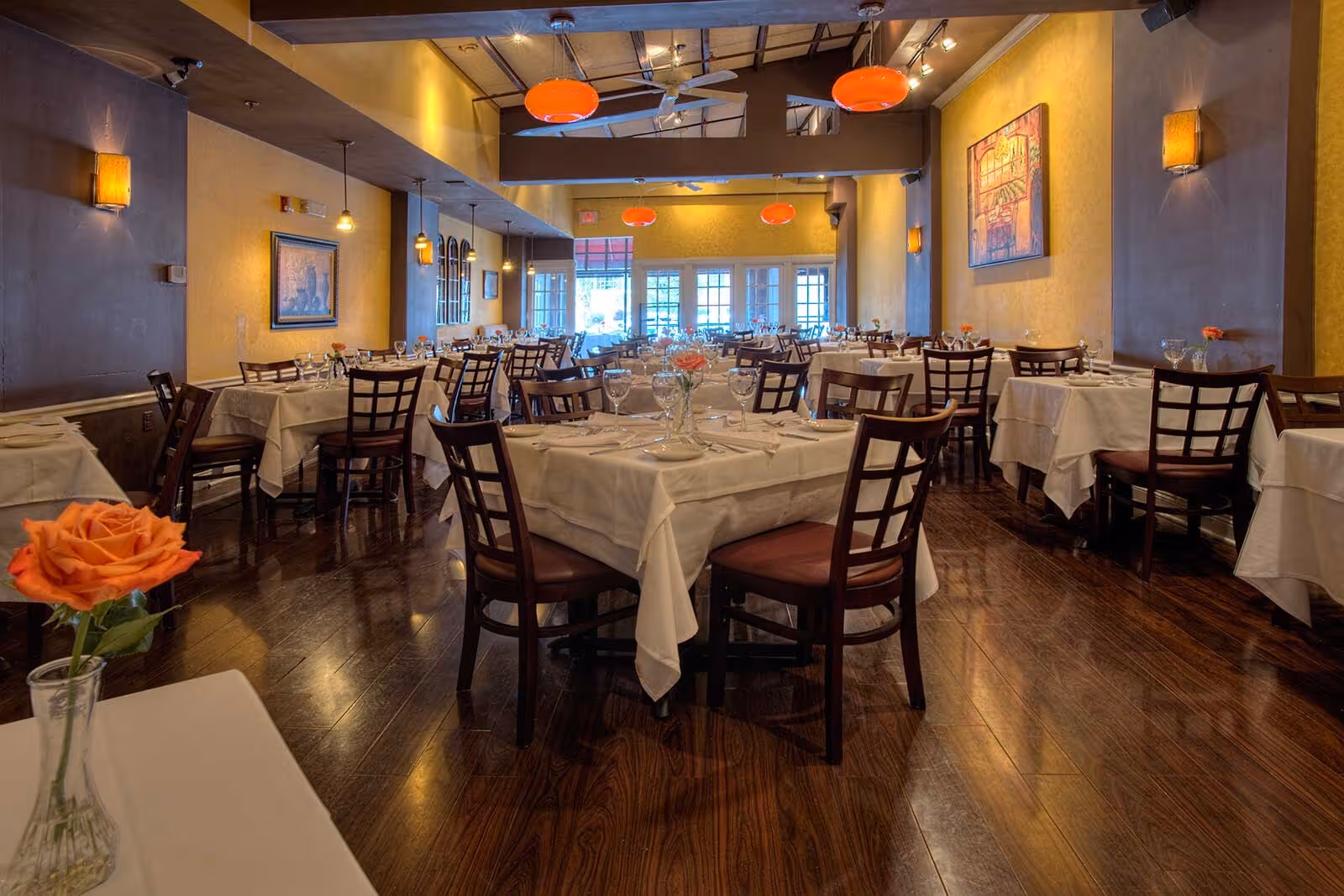Dining room with many set tables