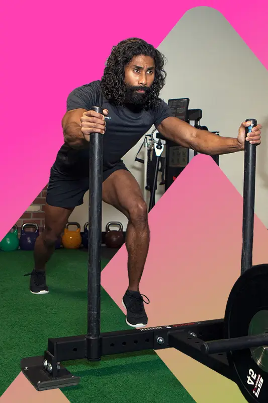 A man is doing a workout on a machine.