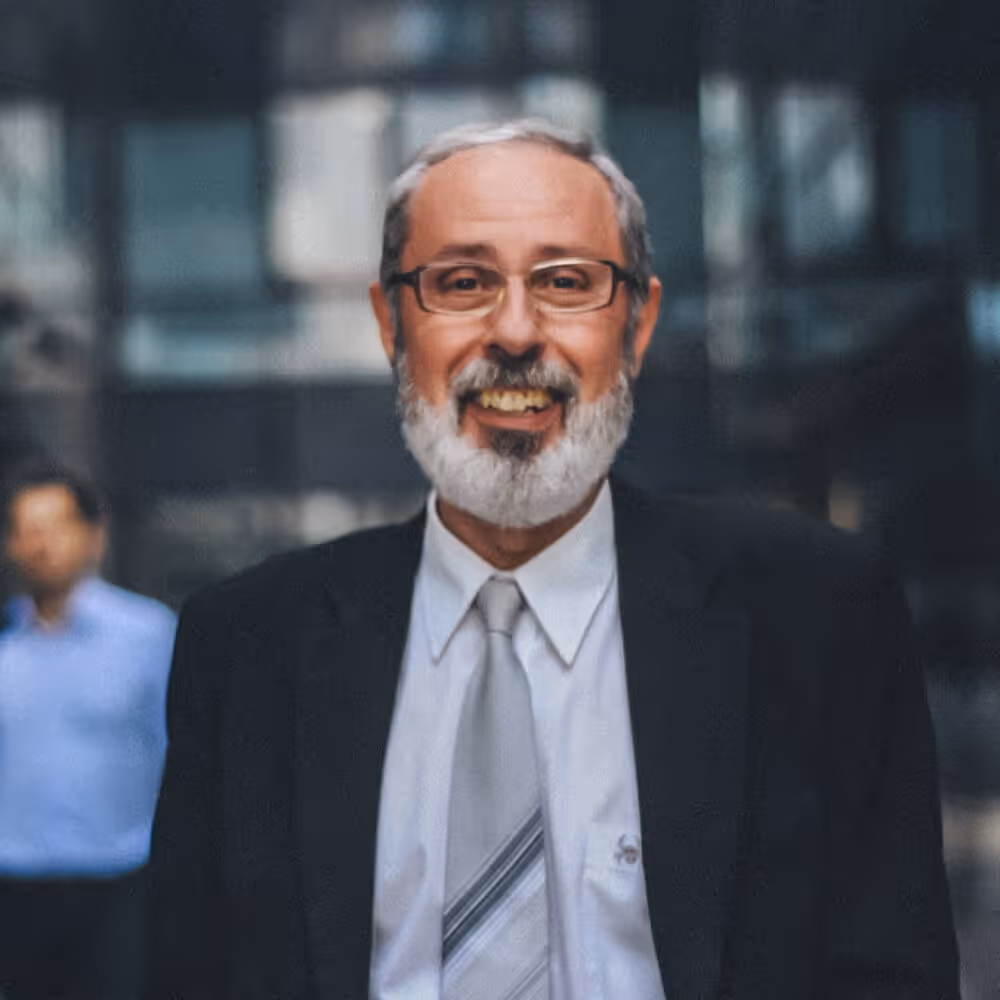 Attorney portrait representing business trial defense and legal representation.