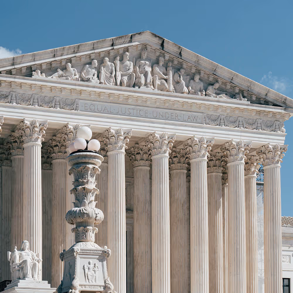 Courthouse building with columns, representing civil litigation and legal proceedings.