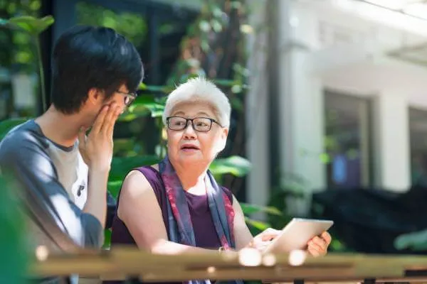 mother talking to her on about transfer of property to him after her death