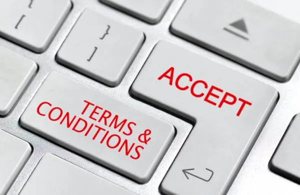 keyboard with keys labeled terms and conditions and accept