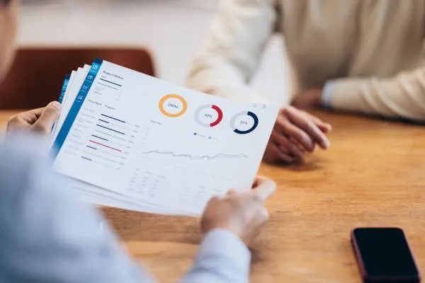 Sell a business discussion and financial documents