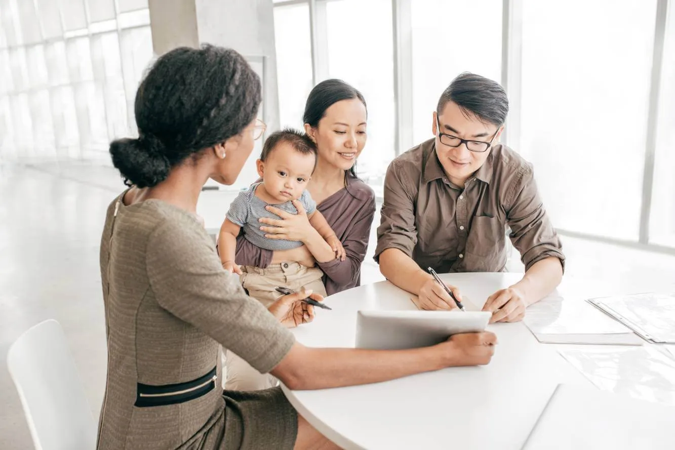 family creating a will with lawyer assistance