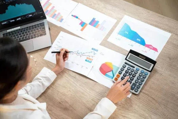 Business owner reviewing financial and tax data
