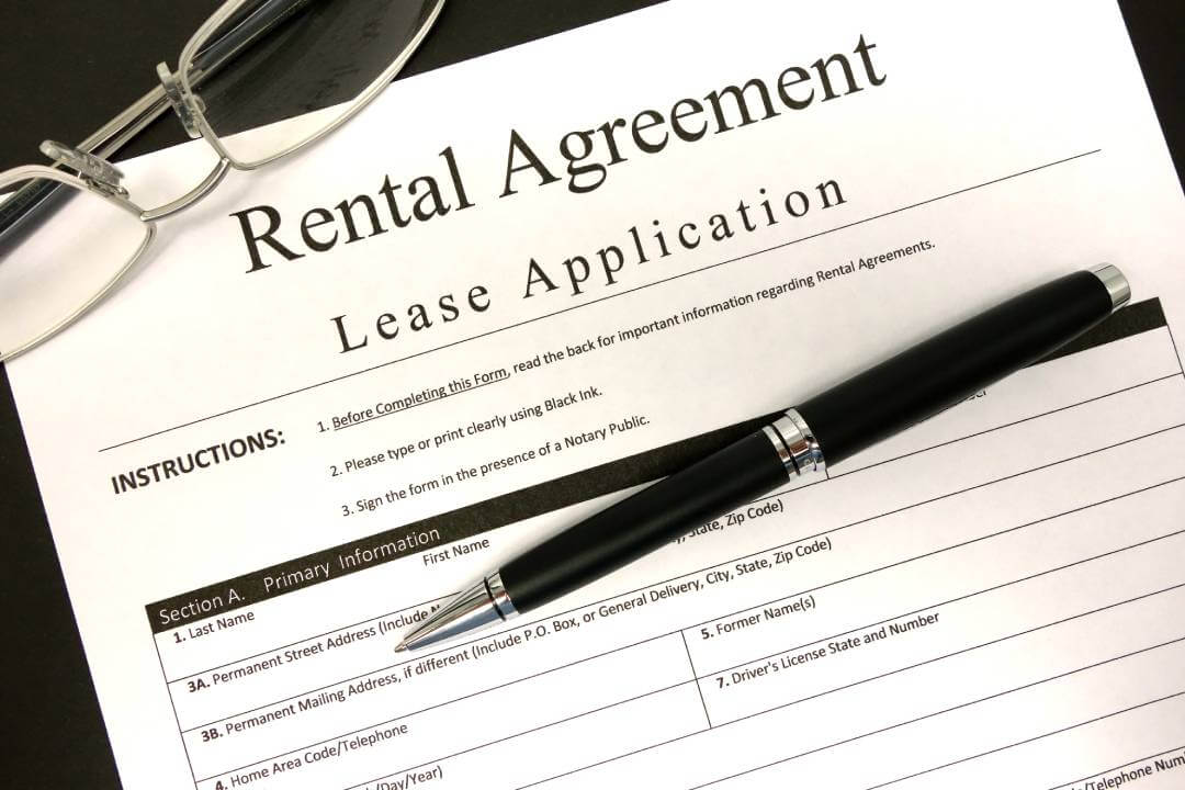 rental agreement lease application and ink pen