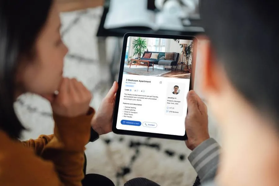 Couple looking at an home for sale online