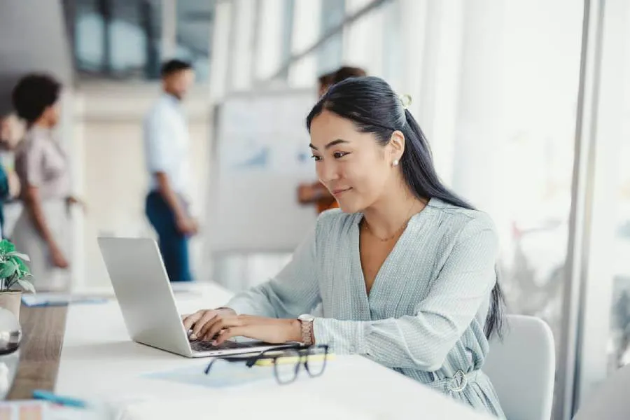 Woman business owner reviewing business formation options