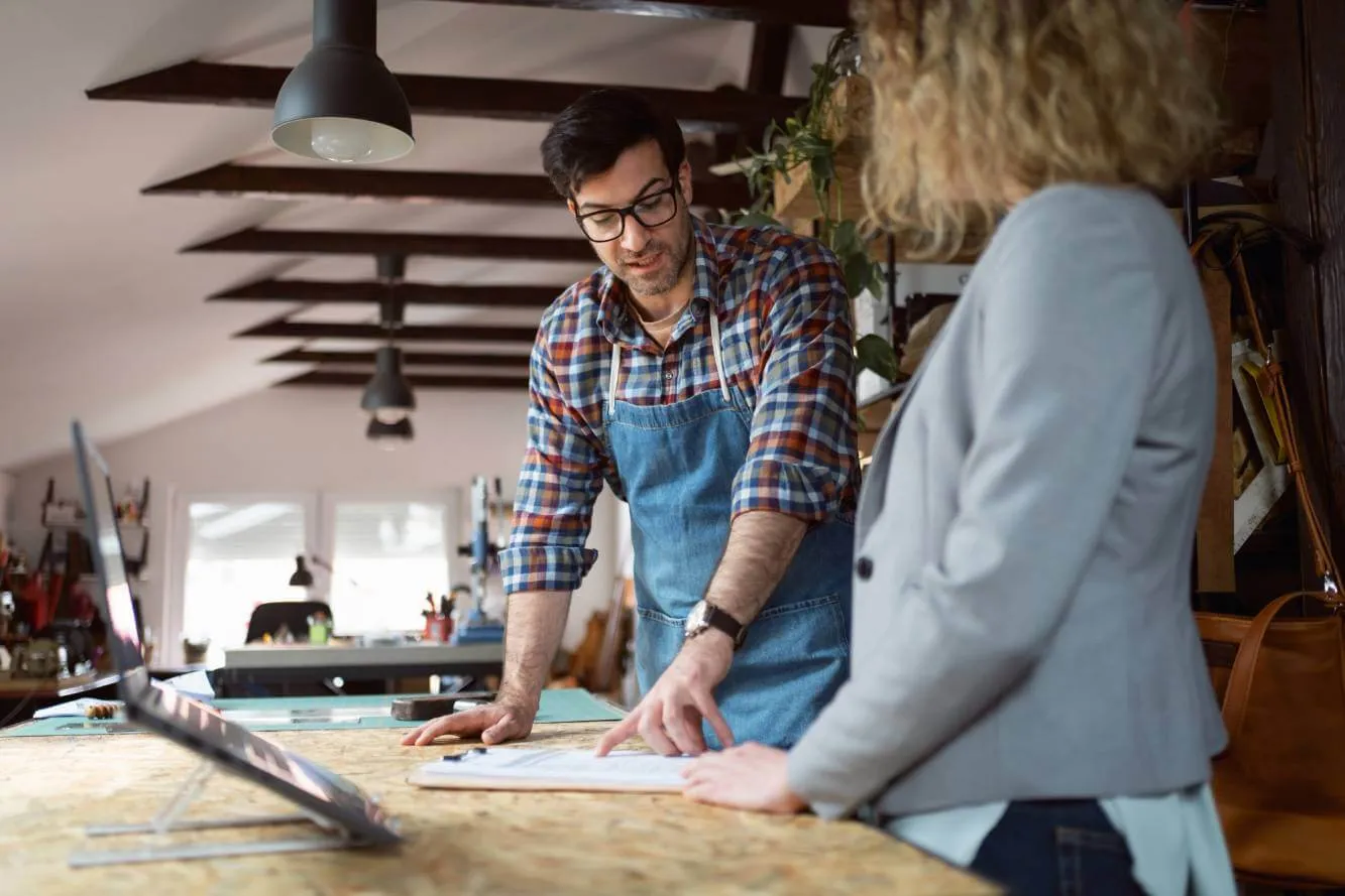 businessman questioning pros and cons of a dba vs llc with lawyer