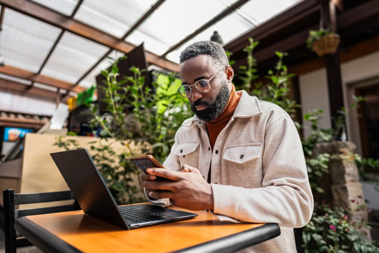 A man on his phone researching using AI for health advice.