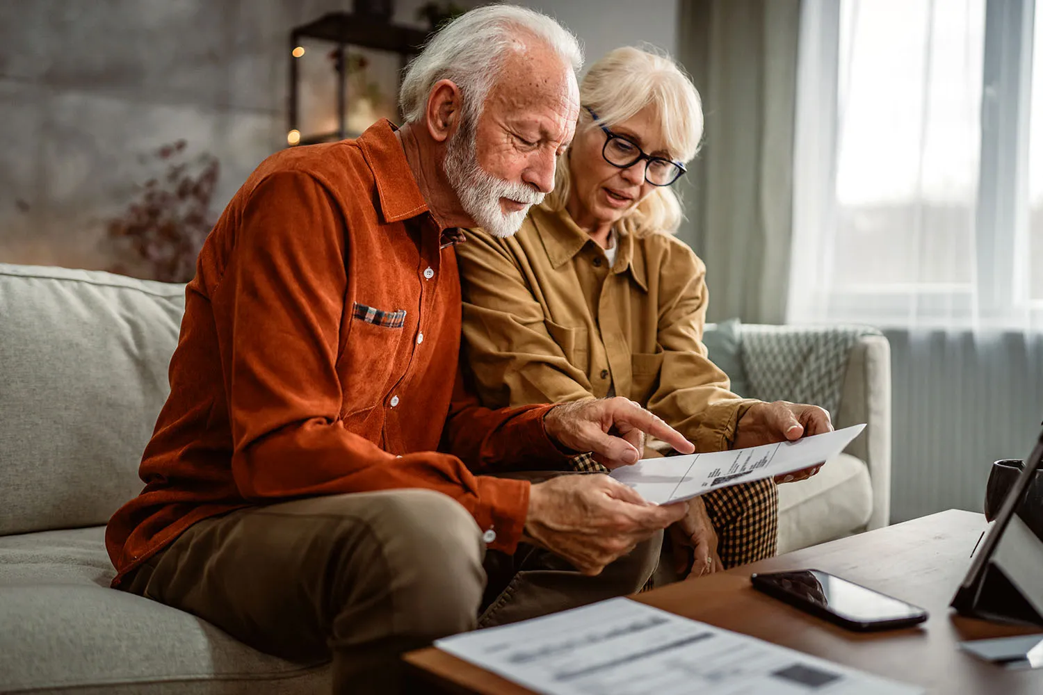 An older couple reviewing documents