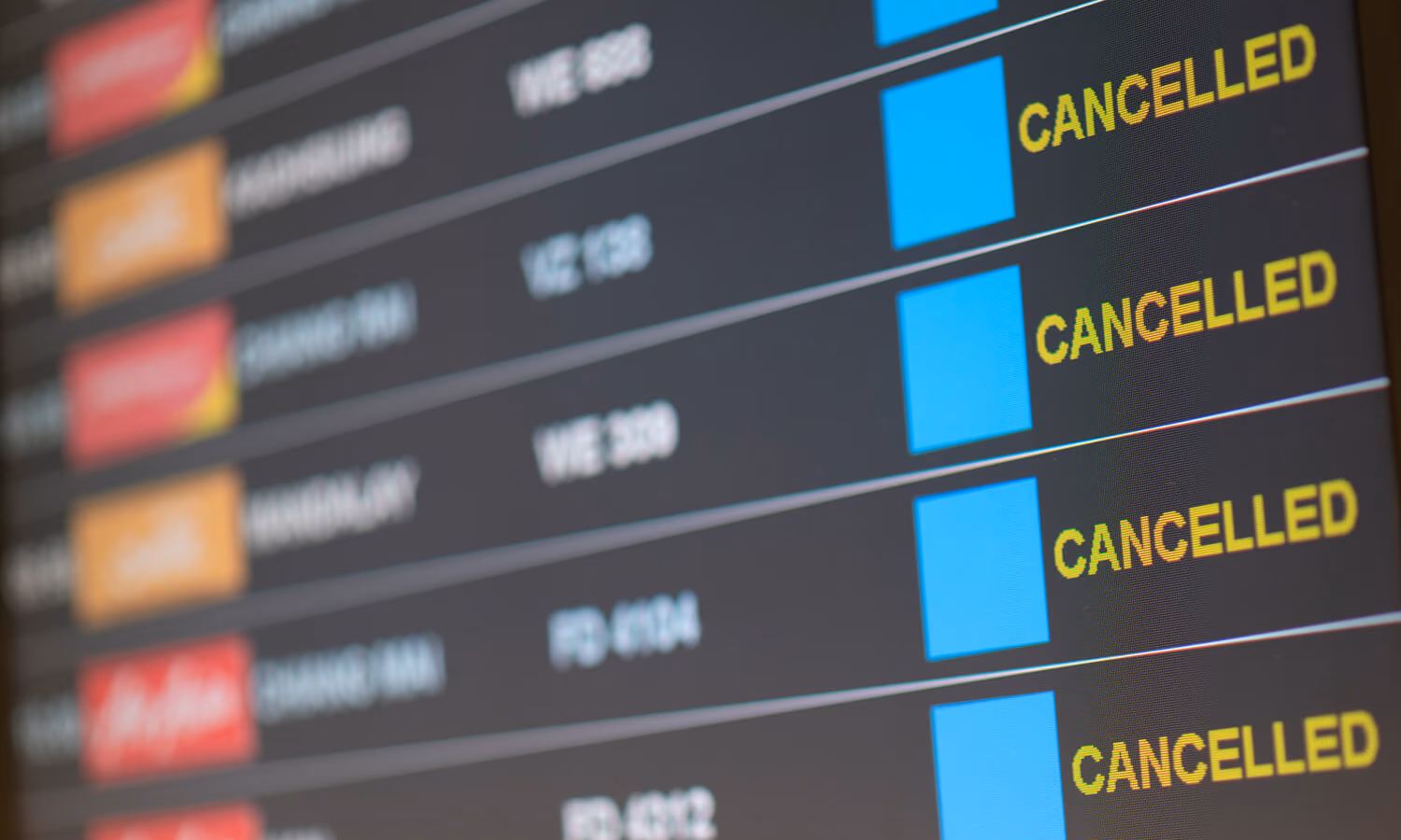 Departure flight board with cancelation at the Airport