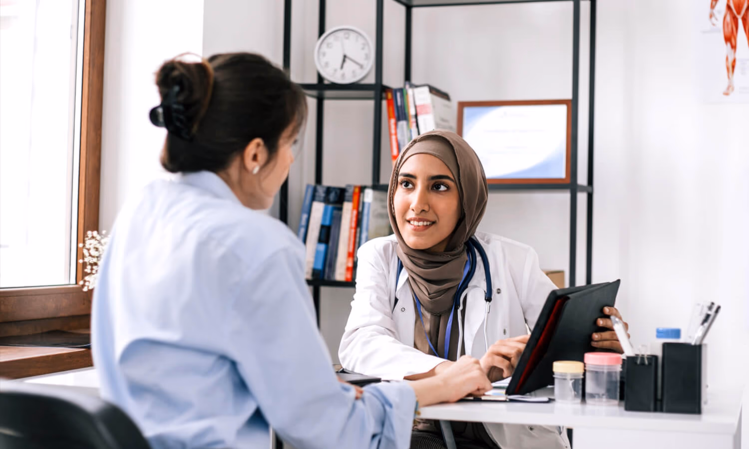 Close up of a young woman having an Asian doctor's appointment