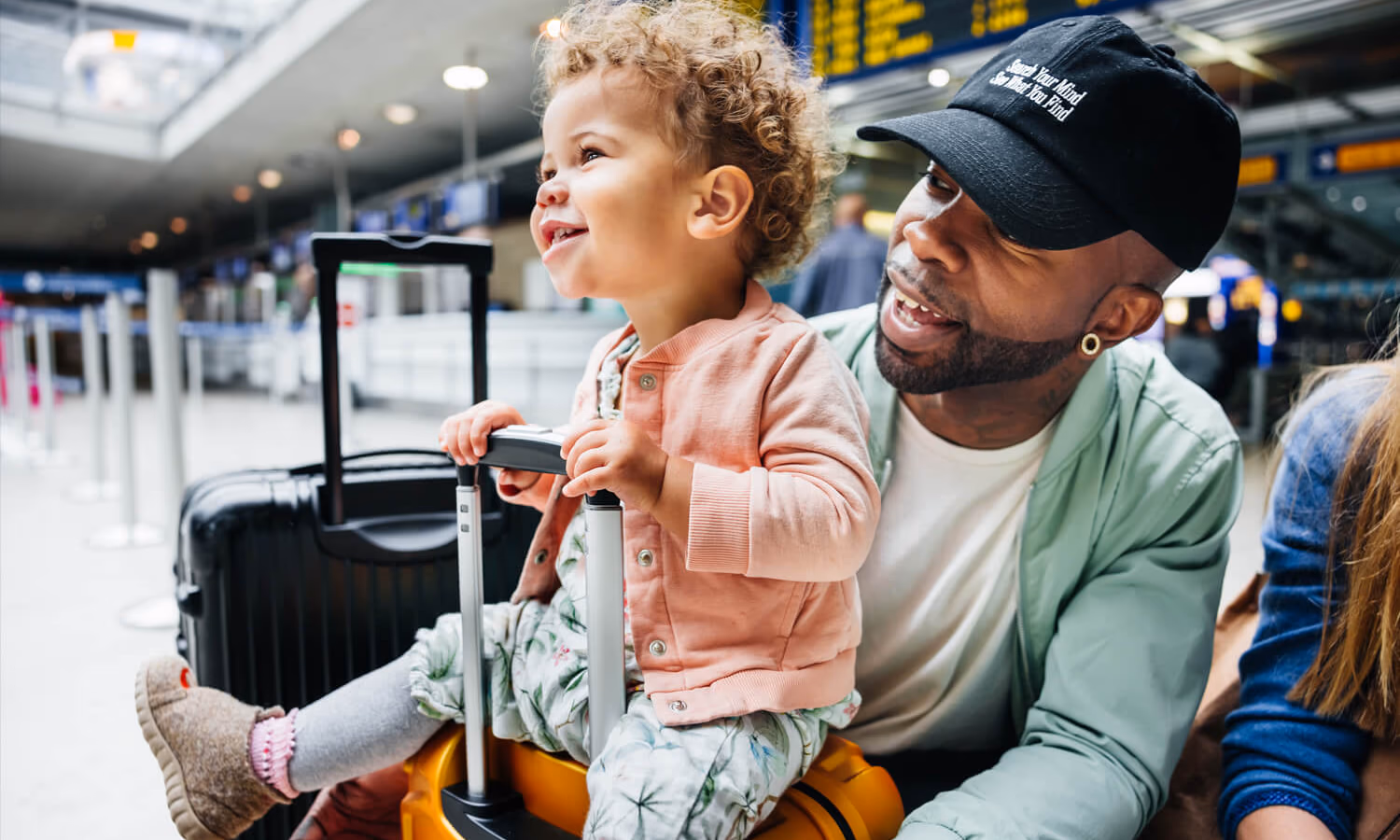 Toddler Sitting On Suitcase