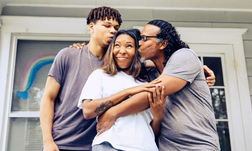 Father kissing his teen daughter as his teenage son stands nearby.|Legacies at Risk: Survey Reveals Nearly 60% of American Unprepared for the Investiable. 20% of American believe having a Will is important, nearly 60% do not have one prepared.