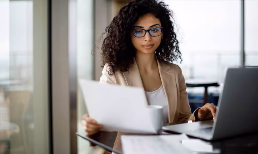 Business owner reviewing agreements