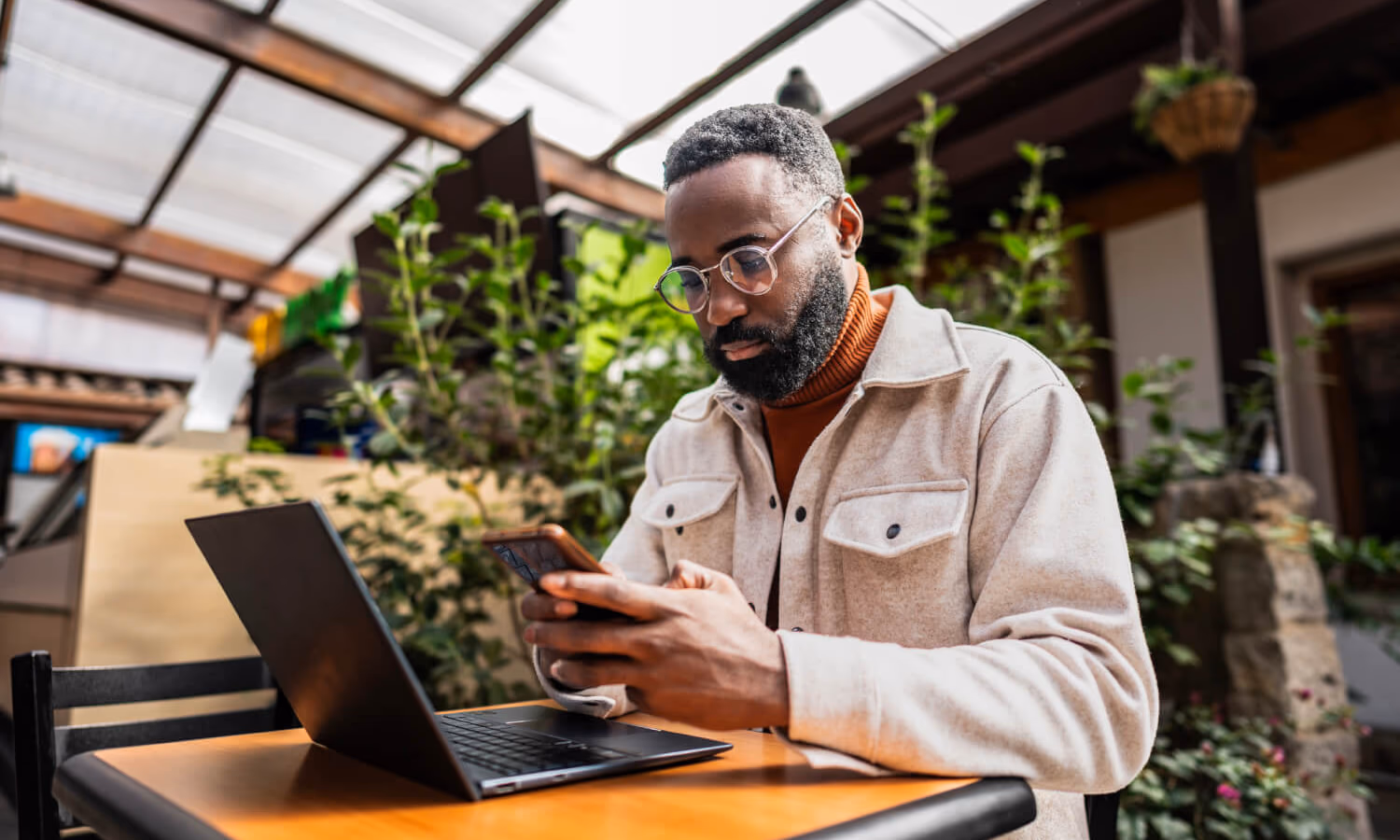 A man on his phone researching using AI for health advice.