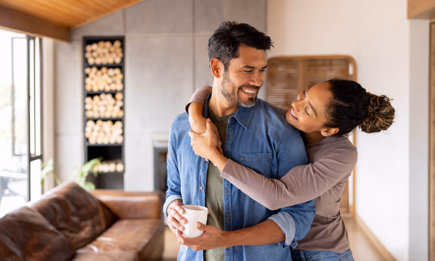 A stock photo of a couple embracing.