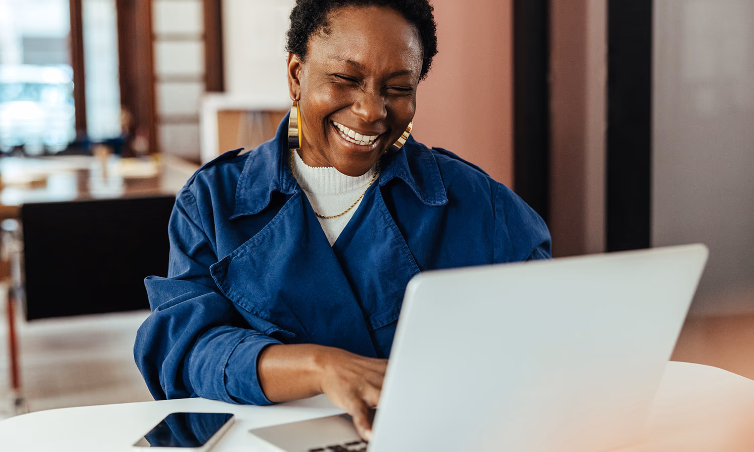A woman working on a laptop