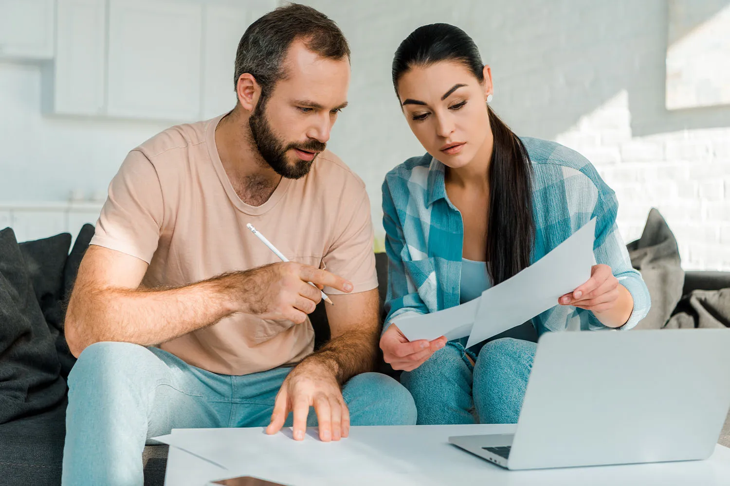 Two people reviewing documents.