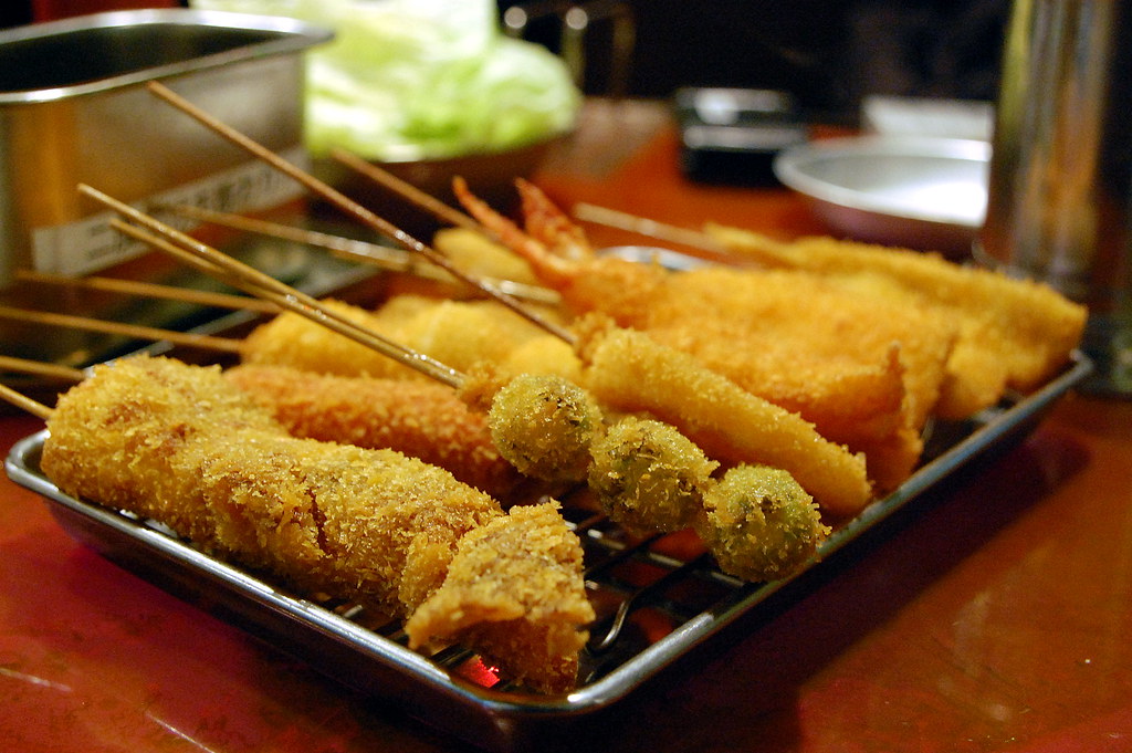 Kushikatsu, deep fried meat and vegetables on skewers, usually come in sets.