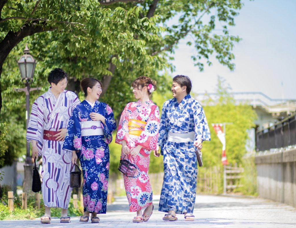 Two men and two women in a modeling shoot for Vasara Kimono Rental, Osaka.