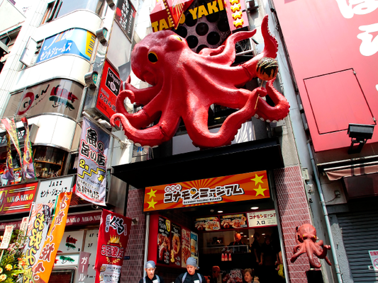 Large octopus statue above Takoyaki themed Dotonbori Konamon Museum (Osaka Museums)