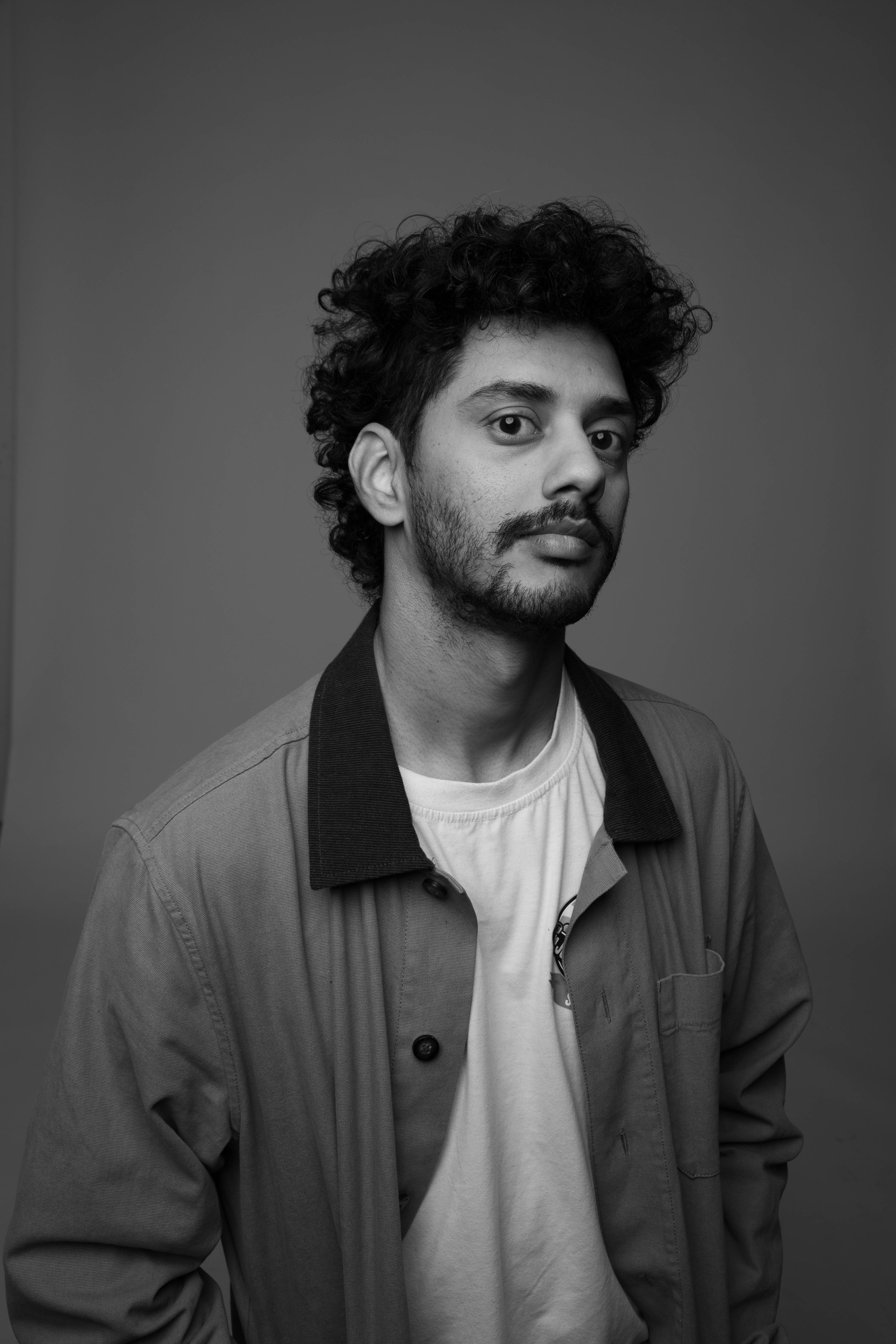 Image shows a headshot of the designer, Tanay