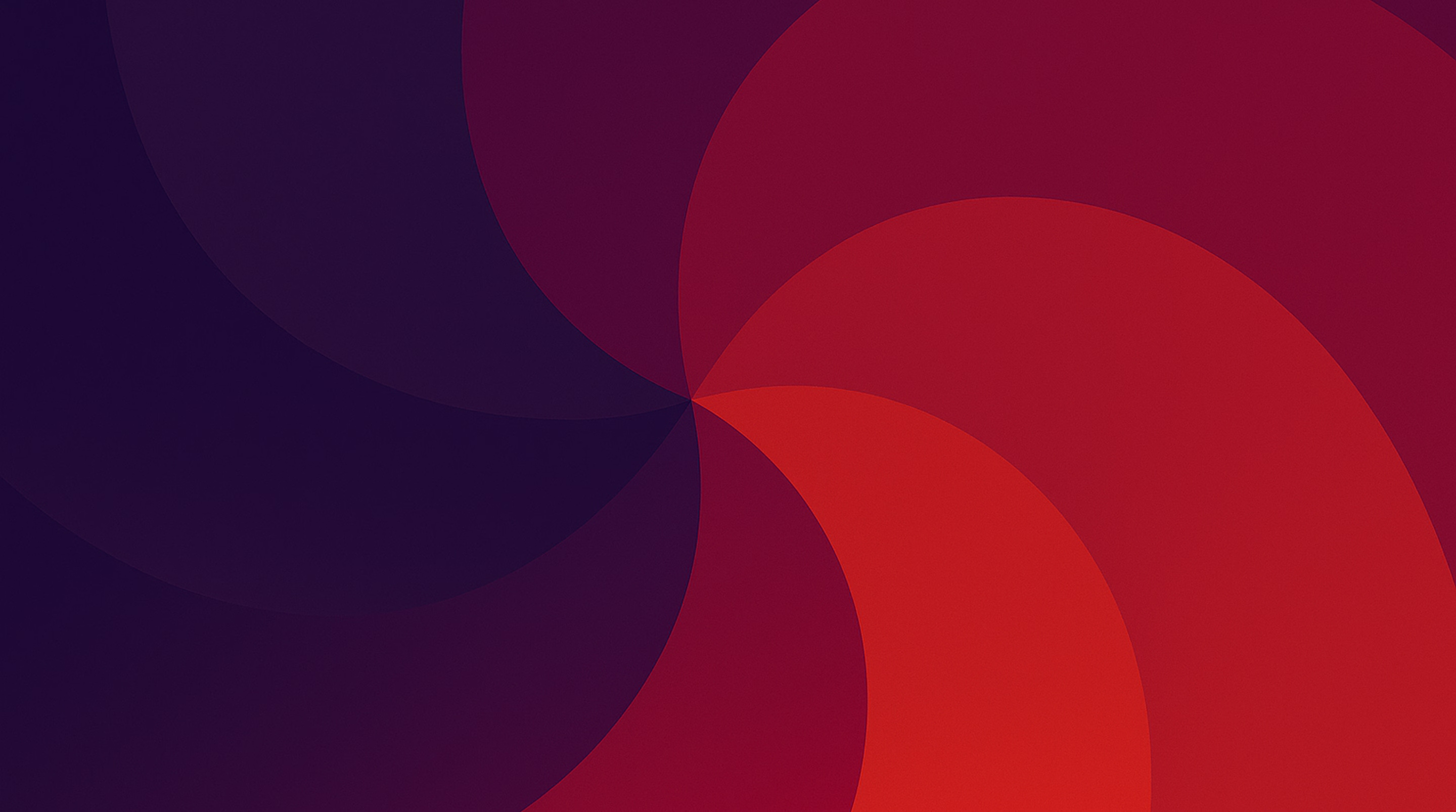 Abstract geometric design with overlapping circular shapes in shades of purple and orange converging at the center.