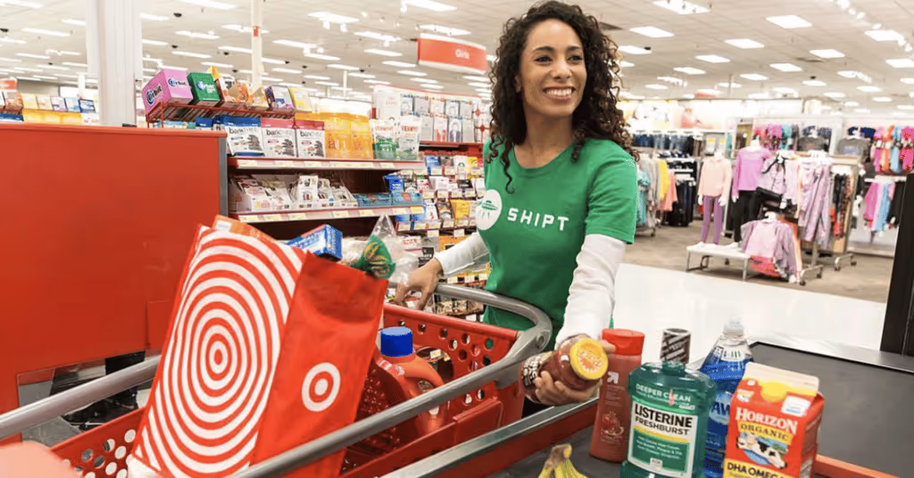 A Shipt shopper loads groceries by a paypoint at Target