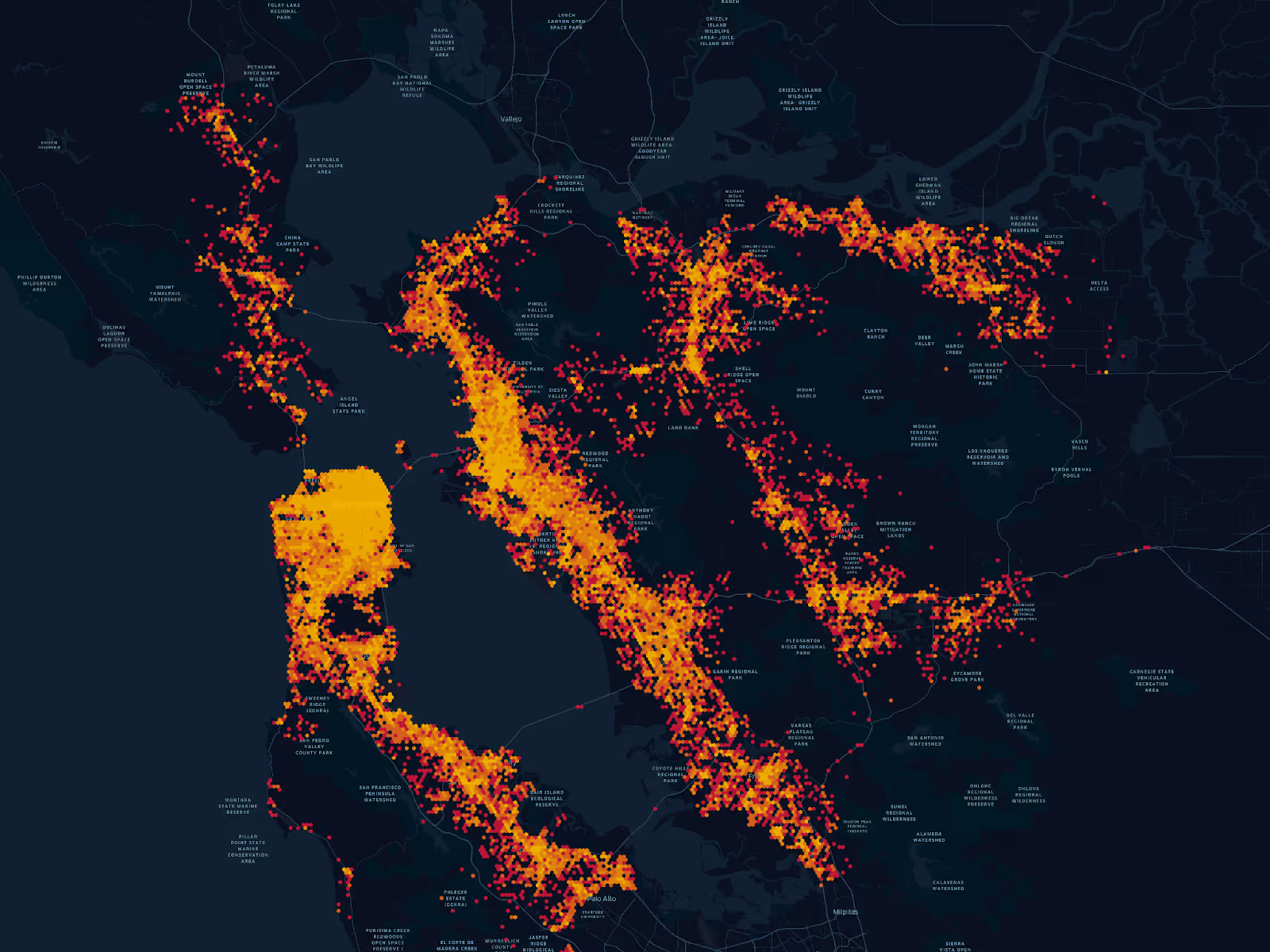 Image displaying a heat map of San Francisco and its surrounding suberbs. Heavily populated areas turn almost solid gold with activity from gig mobility data.