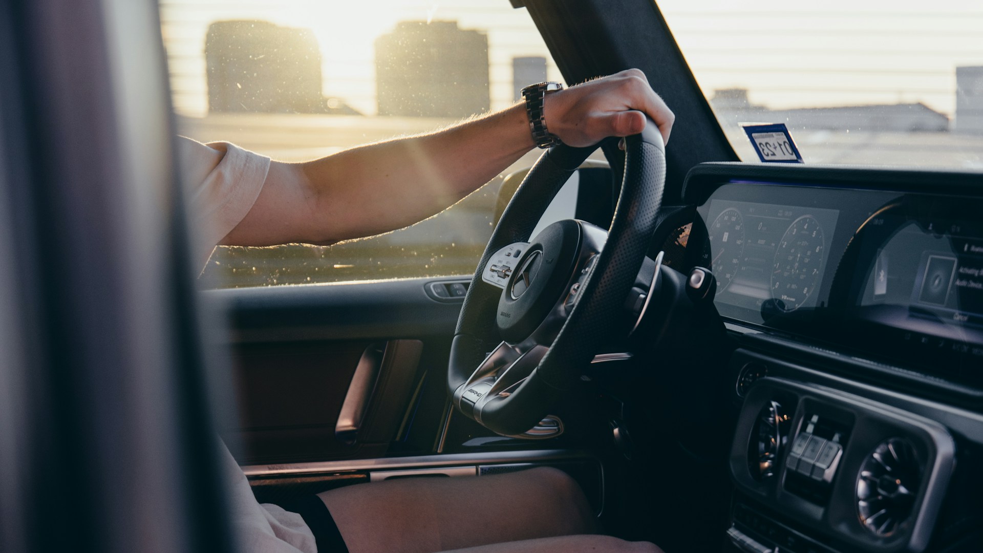 Person driving a car for delivery