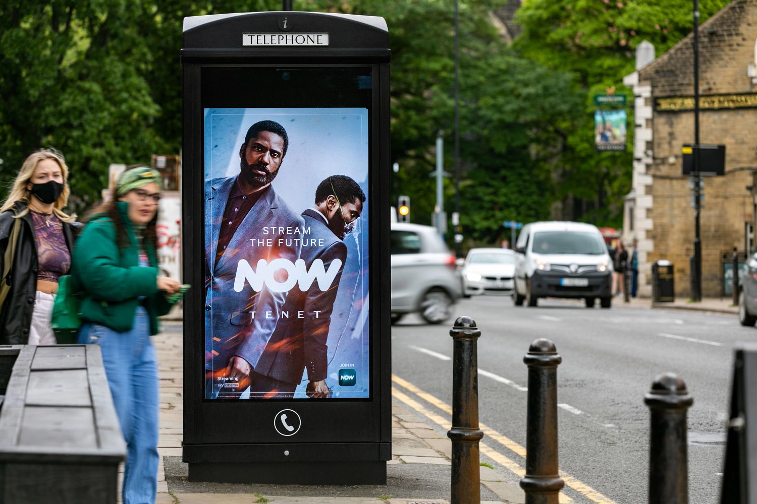 Now TV Tenet ad on digital phone kiosk screen