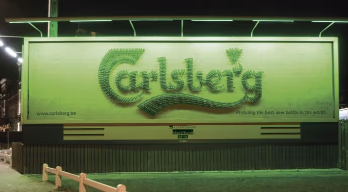 A Carlsberg Create special build ad on a billboard with illumination in 2002