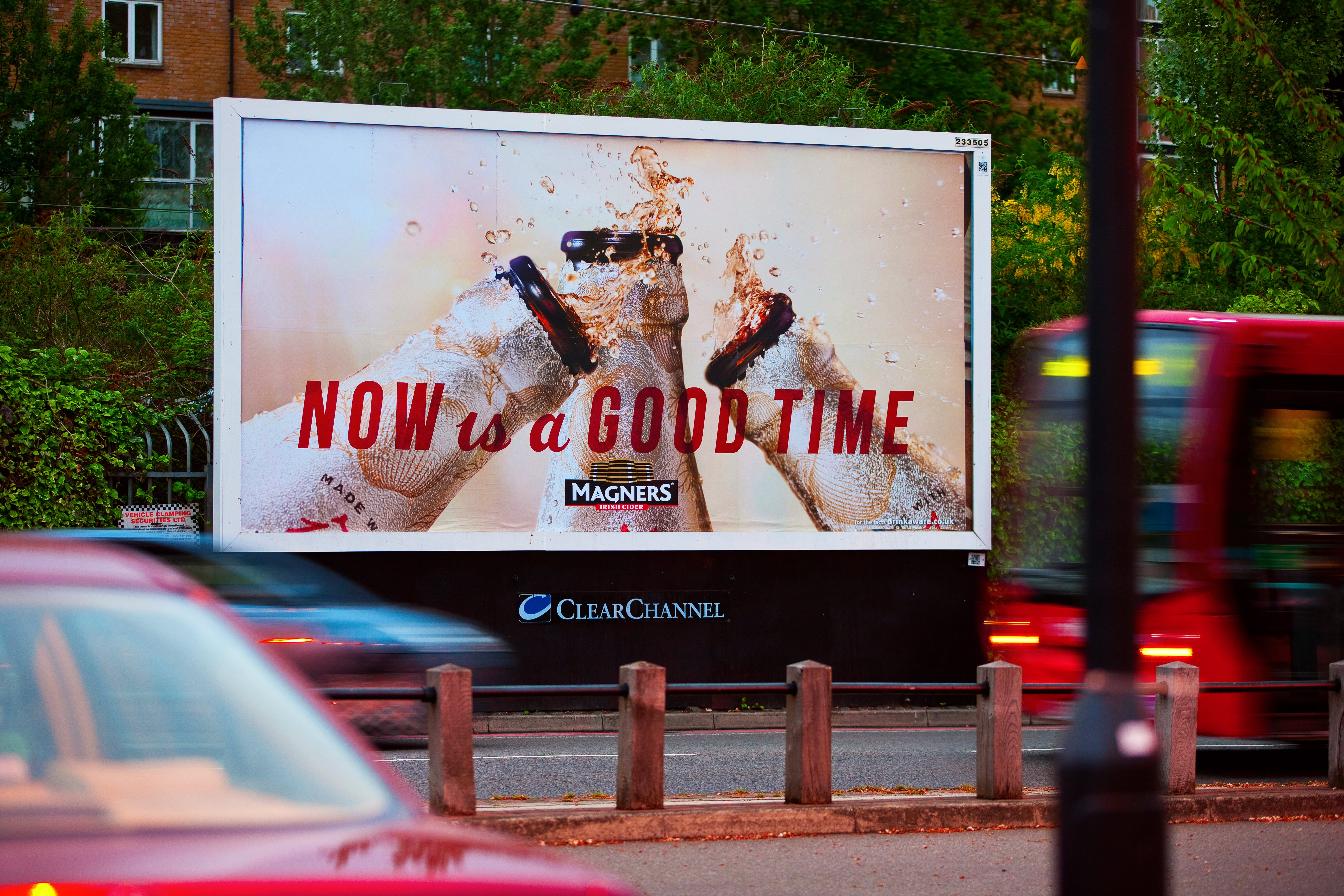 A Magners ad on a Bauer Media Outdoor roadside billboard