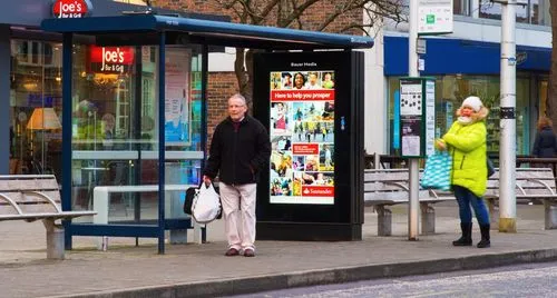 A Santander ad campaign on a digital bus stop screen