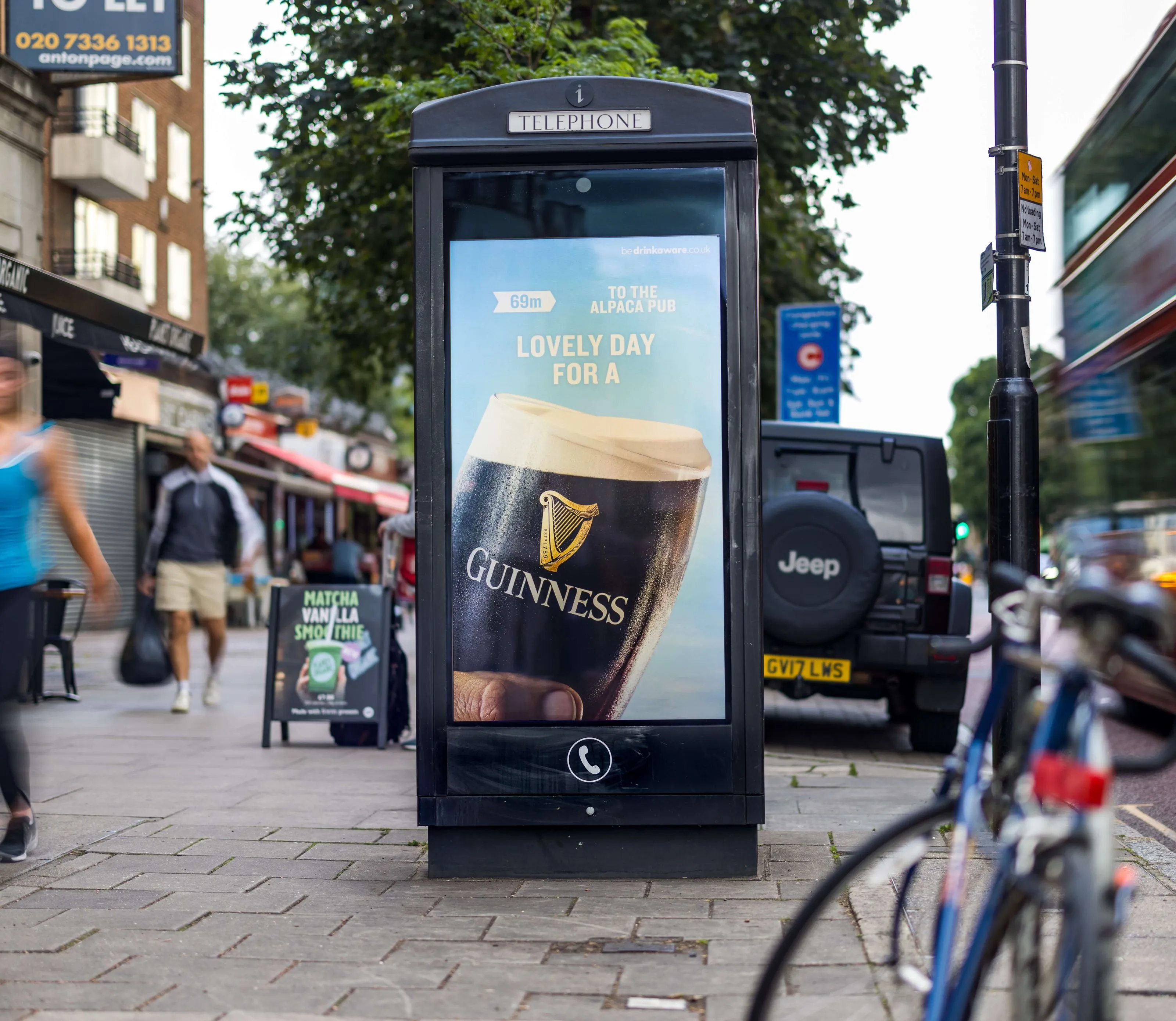Guinness advertising on a Adshel Live digital screen