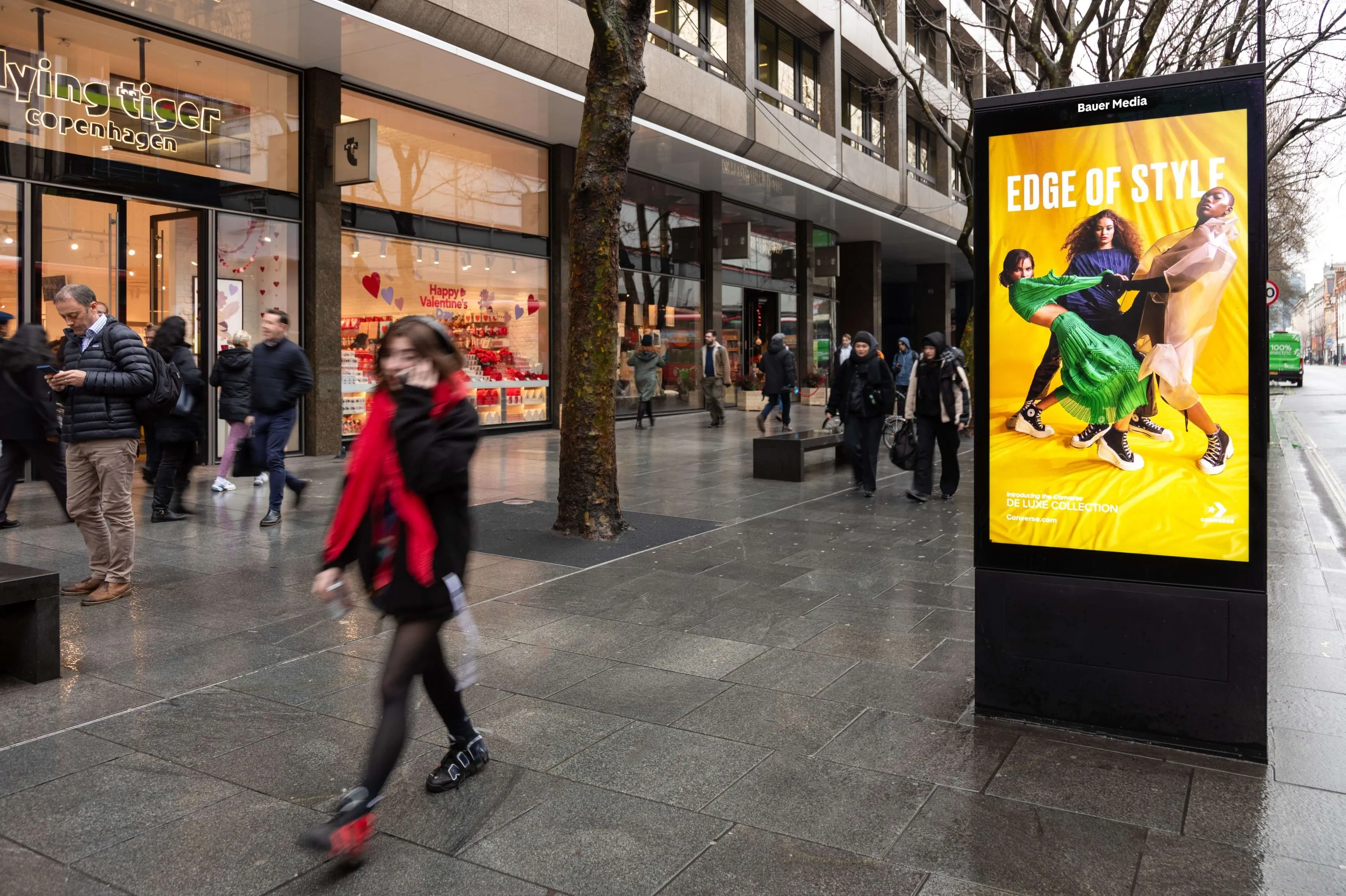 Converse ad campaign on a Bauer Media Outdoor Adshel Live screen