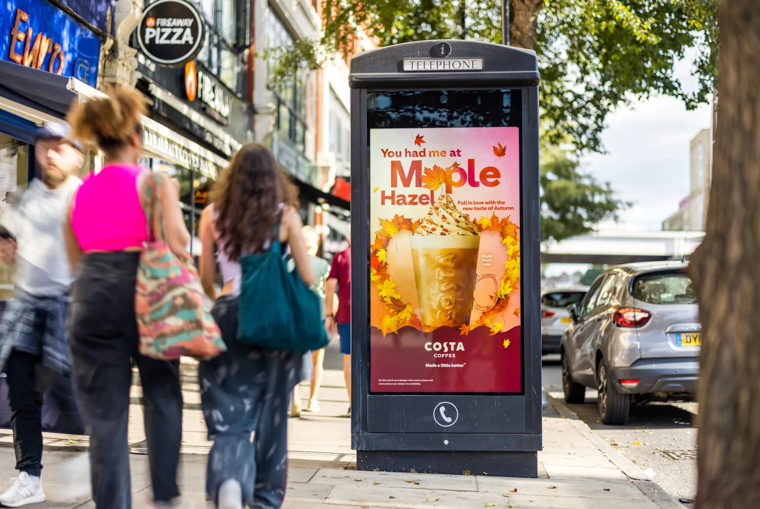 Costa Coffee advertising a maple hazel coffee on an digital payphone