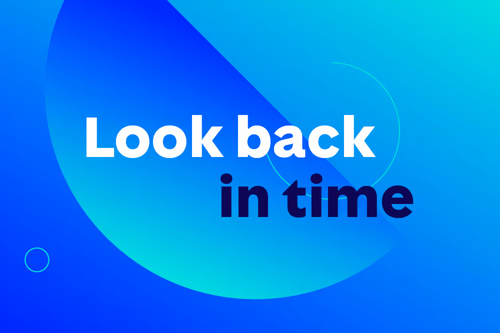 Blue gradient background with the phrase 'Look back in time' in bold white and black text.
