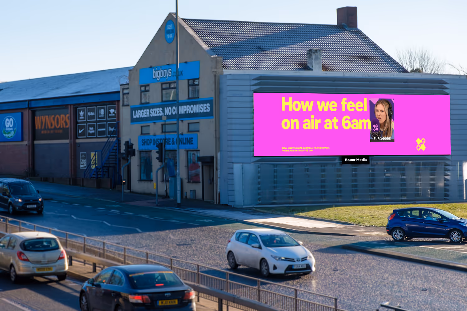 Storm Leeds The Mile, large format digital billboard next to a busy road in summer