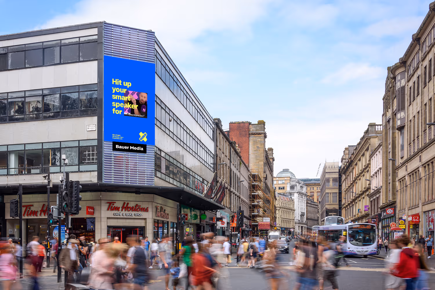 Storm Glasgow Argyle Street advertising screen on the corner of a very high street