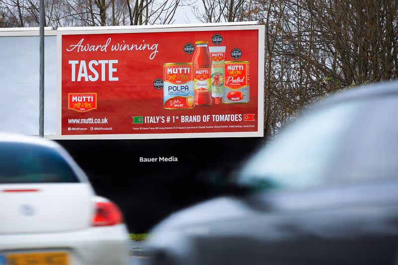 A red billboard campaign