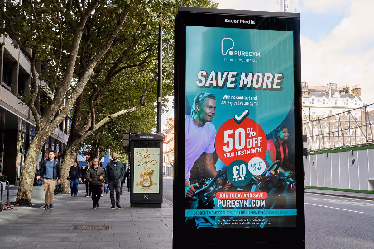 Pure Gym advertising on a roadside poster