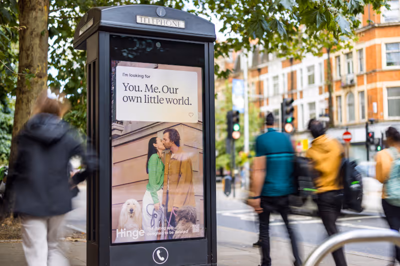 Match.com advertising on a roadside digital payphone