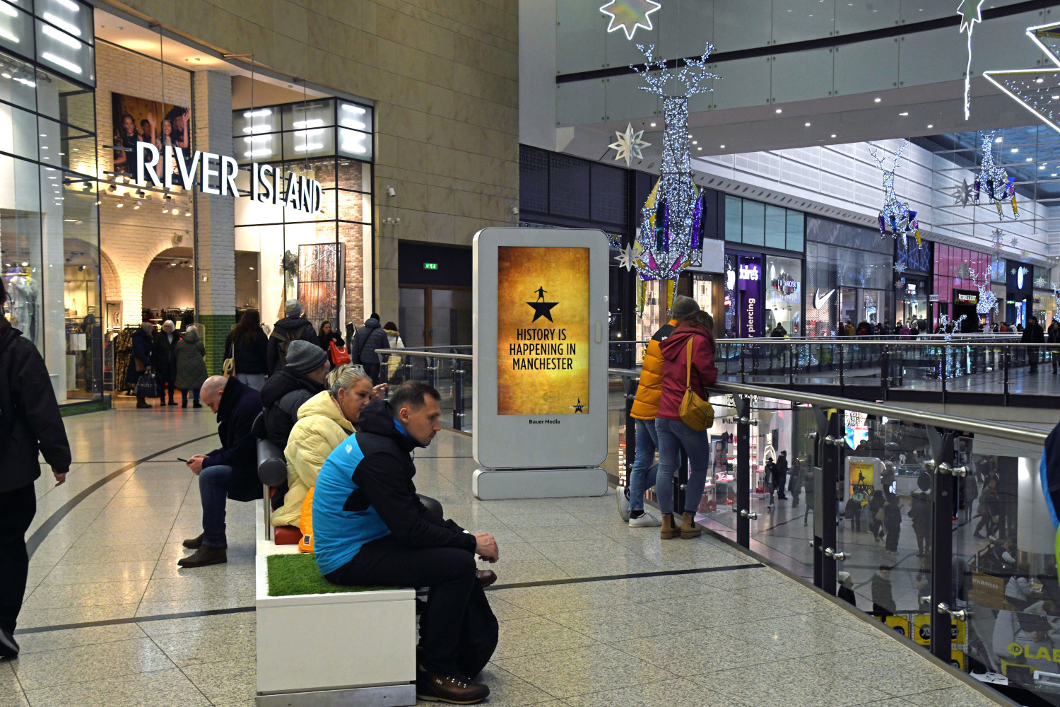 Hamilton show displaying on a shopping mall digital screen