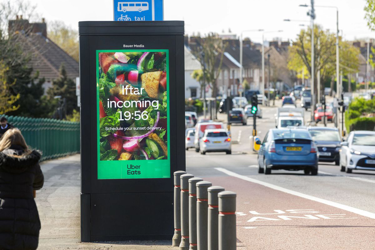 Uber Eat's Ramadan campaign on a digital screen