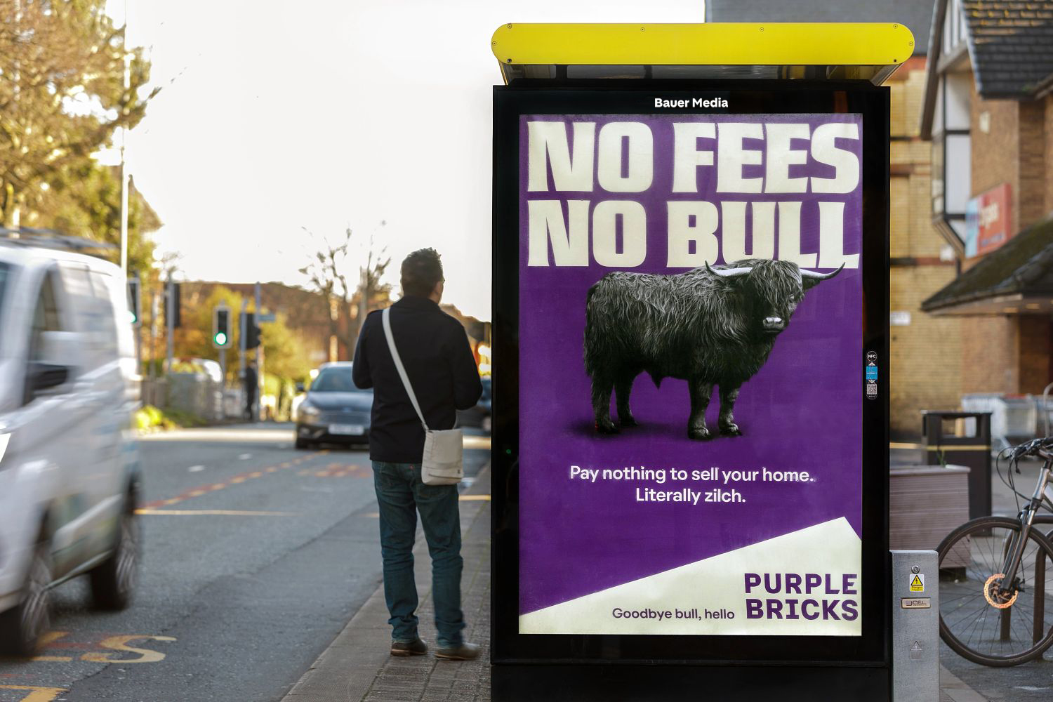 Purple Bricks advertising on a roadside bus stop poster