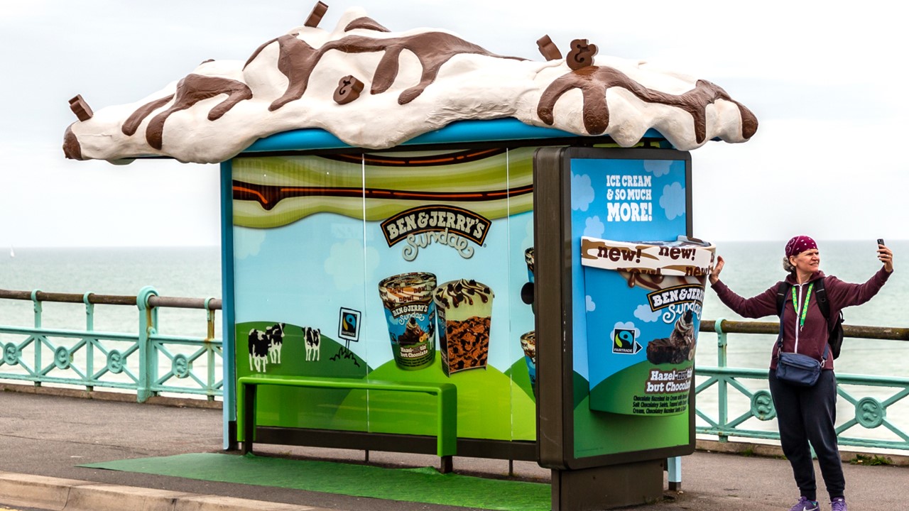 A special build bus shelter promoting Ben & Jerry's ice cream featuring a mock ice cream tub and melted ice cream on the roof