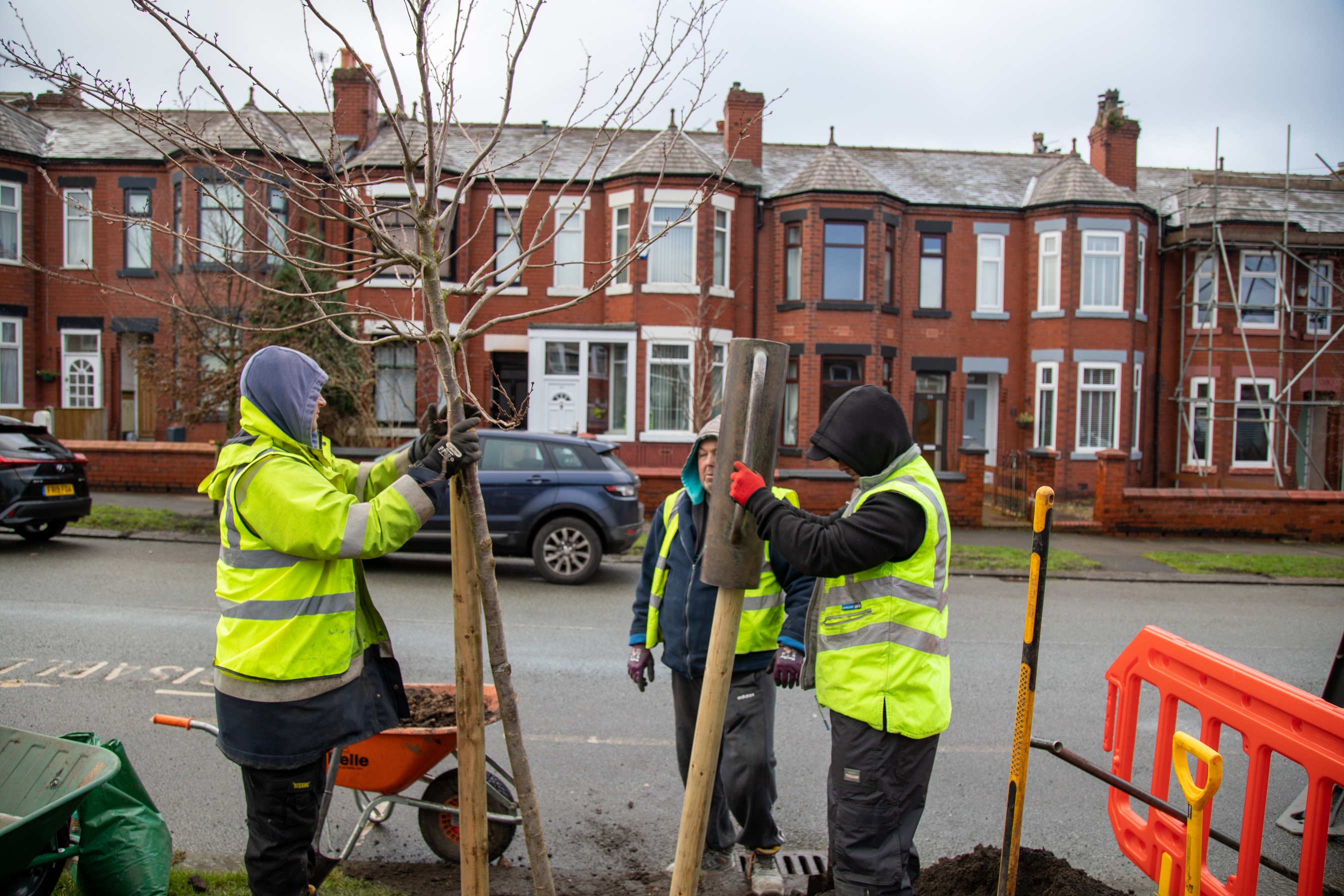 Tree planting in Salford, funded by BMO.